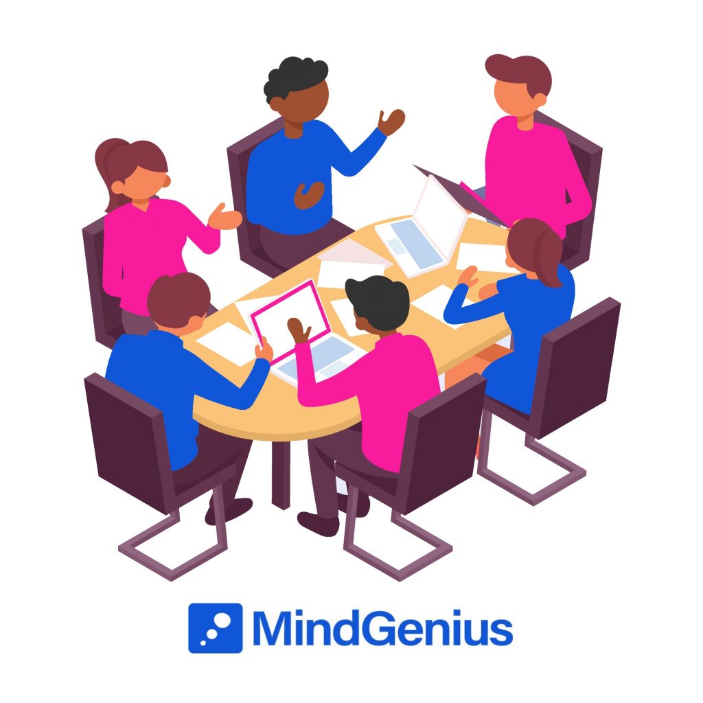 6 people having a meeting at a desk